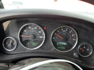 2012 Jeep Wrangler Sport with VIN 1C4AJWAG4CL278063, listed as a Copart auction lot 56313005 with 109,998 mi miles and Salvage title. Bid and sale history available at DreamBid. Image 9.
