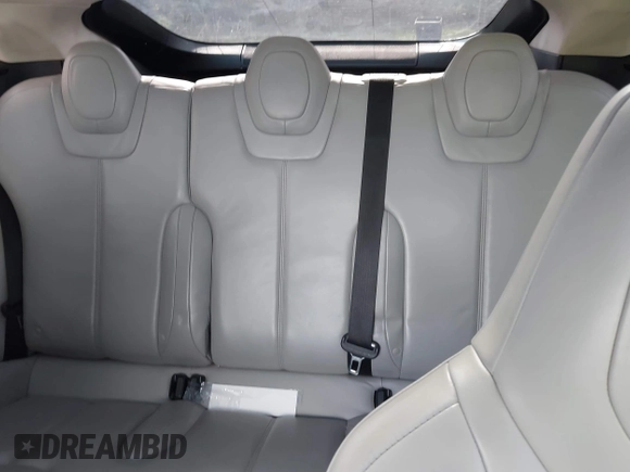 2014 Tesla Model S 60 with VIN 5YJSA1H1XEFP40611, listed as a IAAI auction lot 42826752 with Not provided miles and . Bid and sale history available at DreamBid. Image 8.