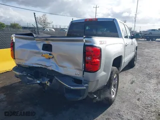 2014 Chevrolet Silverado 1500 LTZ with VIN 3GCUKSEC2EG544724, listed as a IAAI auction lot 41925805 with 70,830 mi miles. Bid and sale history available at carsss.com. Image 4.