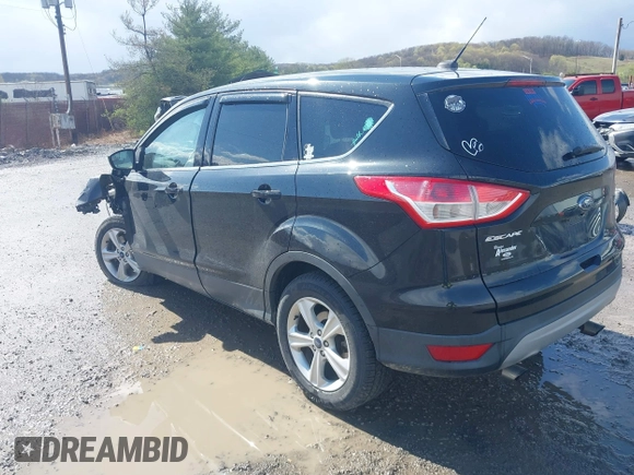 2014 Ford Escape SE with VIN 1FMCU9GX2EUD41176, listed as a IAAI auction lot 42028822 with 101,595 mi miles and . Bid and sale history available at DreamBid. Image 3.