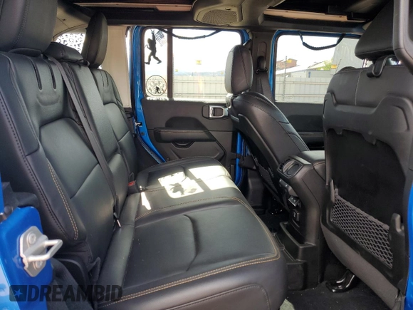 2024 Jeep Wrangler Sahara with VIN 1C4RJXP60RW163829, listed as a Copart auction lot 57182365 with 16,873 mi miles and Salvage title. Bid and sale history available at DreamBid. Image 11.