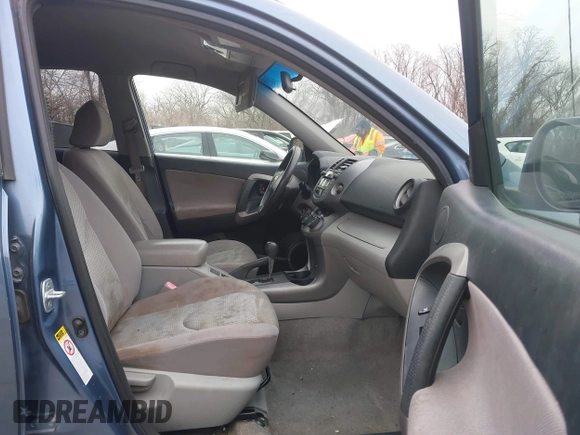 2007 Toyota RAV4 with VIN JTMBK33V875039590, listed as a IAAI auction lot 41545792 with 233,889 mi miles. Bid and sale history available at carsss.com. Image 5.