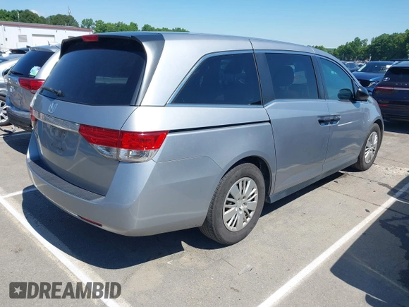 2016 Honda Odyssey LX z VIN 5FNRL5H22GB092614, wystawiony jako IAAI lot #42173633 z przebiegiem 159 387 mil mil oraz . Historia ofert i sprzedaży dostępna na DreamBid. Obrazek 4.