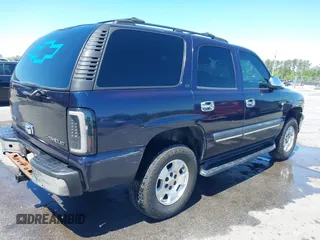 2004 Chevrolet Tahoe LT with VIN 1GNEC13Z44J125913, listed as a IAAI auction lot 42027889 with 205,796 mi miles. Bid and sale history available at carsss.com. Image 6.