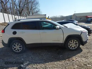 2015 Jeep Cherokee Latitude with VIN 1C4PJMCS7FW503594, listed as a IAAI auction lot 41792820 with 77,325 mi miles. Bid and sale history available at carsss.com. Image 13.