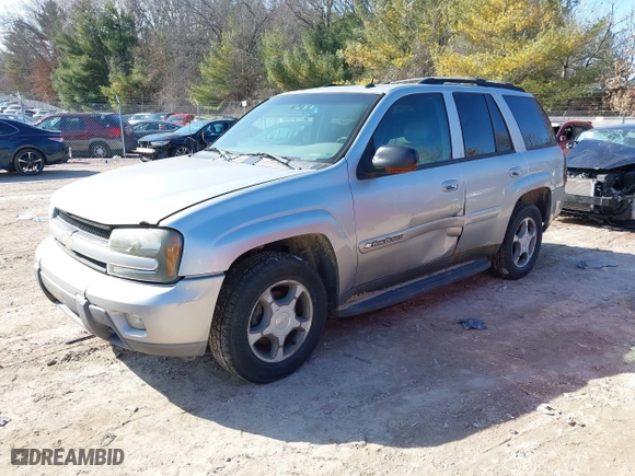 2004 Chevrolet TrailBlazer LS with VIN 1GNDT13S442119957, listed as a IAAI auction lot 41760671 with 233,032 mi miles. Bid and sale history available at carsss.com. Image 2.