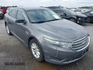2014 Ford Taurus SE z VIN 1FAHP2D88EG143275, wystawiony jako IAAI lot #41801787 z przebiegiem 150 988 mil mil oraz . Historia ofert i sprzedaży dostępna na DreamBid. Obrazek 6.