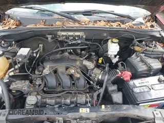 2008 Mazda Tribute Touring with VIN 4F2CZ96178KM16781, listed as a IAAI auction lot 41231644 with Not Provided miles and . Bid and sale history available at DreamBid. Image 10.