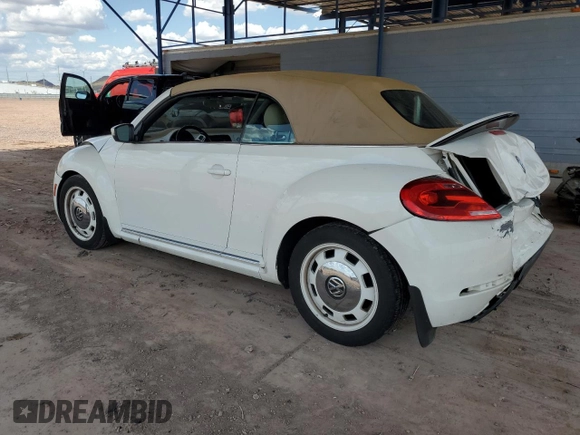 2013 Volkswagen Beetle 2.5L w/Sound/Nav z VIN 3VW5P7AT7DM811992, wystawiony jako Copart lot #59526355 z przebiegiem 102 542 mil mil oraz Szkoda całkowita • Salvage title. Historia ofert i sprzedaży dostępna na DreamBid. Obrazek 2.