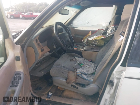 1998 Ford Explorer XLT z VIN 1FMZU32P9WZC01127, wystawiony jako IAAI lot #42310558 z przebiegiem Nie podano mil oraz . Historia ofert i sprzedaży dostępna na DreamBid. Obrazek 5.