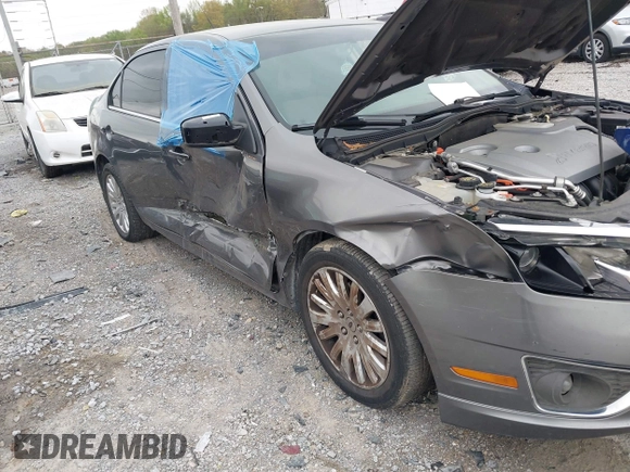 2010 Ford Fusion Hybrid z VIN 3FADP0L31AR326917, wystawiony jako IAAI lot #41938486 z przebiegiem 132 845 mil mil oraz . Historia ofert i sprzedaży dostępna na DreamBid. Obrazek 6.