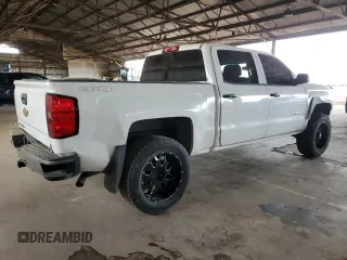 2014 Chevrolet Silverado 1500 Work Truck with VIN 3GCUKPEH0EG272876, listed as a Copart auction lot 82797464 with 148,730 mi miles and Salvage Title. Bid and sale history available at DreamBid. Image 3.