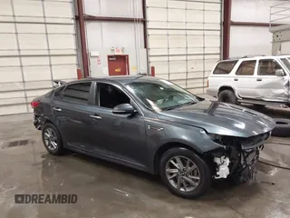 2019 Kia Optima LX z VIN 5XXGT4L33KG375854, wystawiony jako IAAI lot #42235507 z przebiegiem 87 789 mil mil oraz . Historia ofert i sprzedaży dostępna na DreamBid. Obrazek 1.