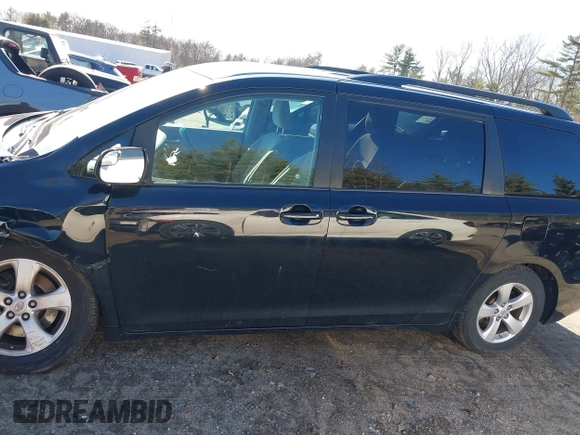 2015 Toyota Sienna LE AAS with VIN 5TDKK3DCXFS594370, listed as a IAAI auction lot 41910126 with 131,638 mi miles. Bid and sale history available at carsss.com. Image 14.