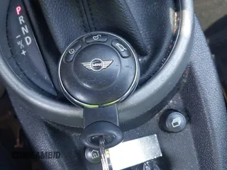 2012 MINI Countryman S z VIN WMWZC3C55CWL83472, wystawiony jako IAAI lot #42289981 z przebiegiem 101 812 mil mil oraz . Historia ofert i sprzedaży dostępna na DreamBid. Obrazek 11.