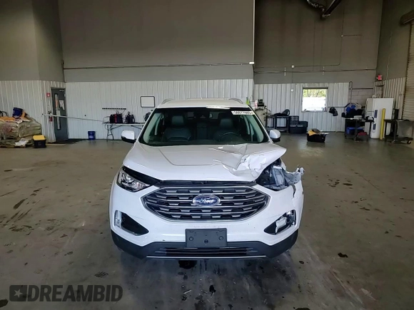2020 Ford Edge SEL z VIN 2FMPK4J96LBA41535, wystawiony jako Copart lot #56077665 z przebiegiem 55 666 mil mil oraz Szkoda całkowita • Salvage title. Historia ofert i sprzedaży dostępna na DreamBid. Obrazek 14.