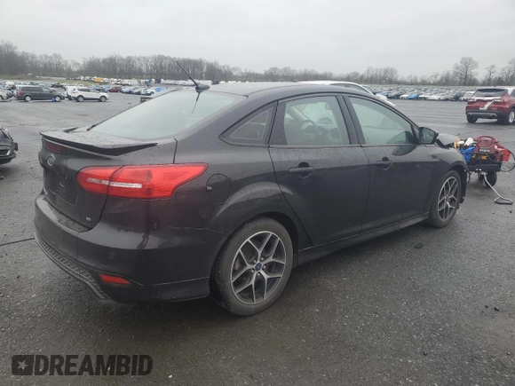 2015 Ford Focus SE with VIN 1FADP3F24FL251916, listed as a Copart auction lot 52800145 with 131,862 mi miles and Salvage Title. Bid and sale history available at DreamBid. Image 3.
