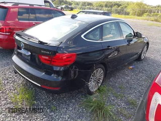 2014 BMW 3 Series 328i Gran Turismo xDrive with VIN WBA3X5C57ED558521, listed as a IAAI auction lot 42726557 with 138,155 mi miles and . Bid and sale history available at DreamBid. Image 4.