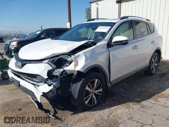 2017 Toyota RAV4 XLE with VIN JTMWFREV9HJ128521, listed as a IAAI auction lot 41658054 with 106,788 mi miles and . Bid and sale history available at DreamBid. Image 2.