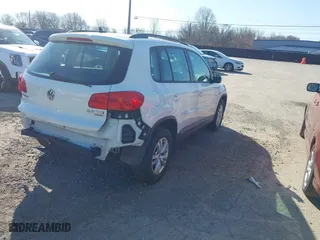 2015 Volkswagen Tiguan S with VIN WVGBV7AX5FW610055, listed as a IAAI auction lot 41502961 with 81,683 mi miles. Bid and sale history available at carsss.com. Image 4.