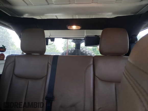 2014 Jeep Wrangler Unlimited Rubicon with VIN 1C4BJWFGXEL291187, listed as a Copart auction lot 54897675 with 227,478 mi miles and Salvage title. Bid and sale history available at DreamBid. Image 10.