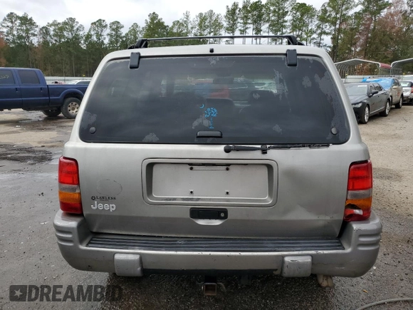 1997 Jeep Grand Cherokee Limited with VIN 1J4GZ78Y0VC682949, listed as a Copart auction lot 82152424 with 194,576 mi miles and Salvage Title. Bid and sale history available at carsss.com. Image 6.