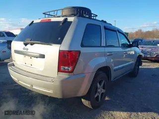 2007 Jeep Grand Cherokee Laredo with VIN 1J8GS48K07C630303, listed as a IAAI auction lot 40993022 with 254,294 mi miles. Bid and sale history available at carsss.com. Image 4.
