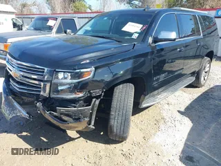 2019 Chevrolet Suburban LT with VIN 1GNSCJKC5KR360318, listed as a IAAI auction lot 41504344 with 82,997 mi miles and . Bid and sale history available at DreamBid. Image 17.