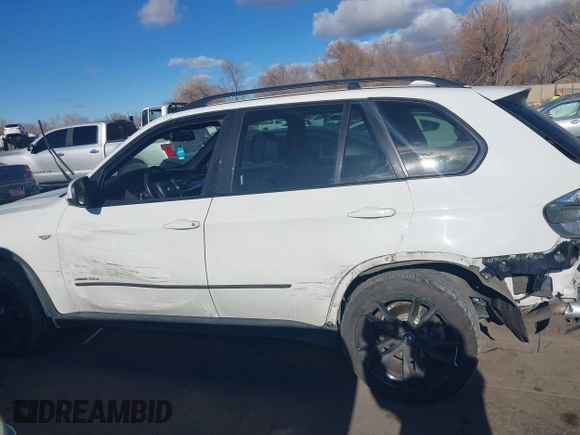 2012 BMW X5 35d with VIN 5UXZW0C56CL665631, listed as a IAAI auction lot 41055705 with 179,408 mi miles and . Bid and sale history available at DreamBid. Image 14.