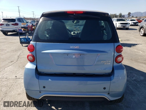 2014 Smart fortwo Passion z VIN WMEEJ9AA5EK778600, wystawiony jako Copart lot #70270444 z przebiegiem 20 545 mil mil oraz Tytuł czysty. Historia ofert i sprzedaży dostępna na DreamBid. Obrazek 6.