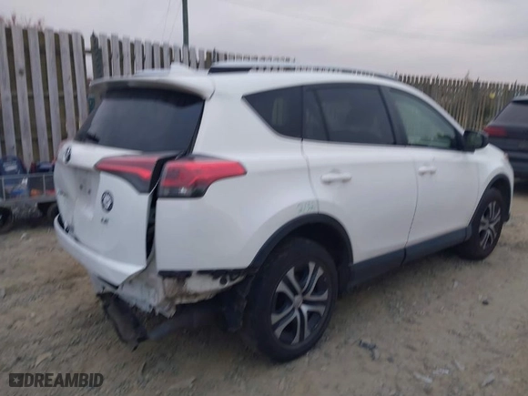 2016 Toyota RAV4 LE with VIN JTMZFREV0GD080773, listed as a IAAI auction lot 40927109 with 182,549 mi miles. Bid and sale history available at carsss.com. Image 4.