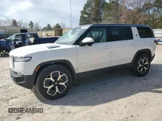 2024 Rivian R1S Adventure with VIN 7PDSGABA1RN030813, listed as a Copart auction lot 47614385 with 16,946 mi miles and Salvage Title. Bid and sale history available at carsss.com. Image 1.