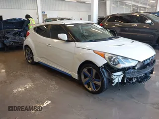 2013 Hyundai Veloster Turbo with VIN KMHTC6AE8DU085262, listed as a IAAI auction lot 41607267 with 200,159 mi miles and . Bid and sale history available at DreamBid. Image 1.