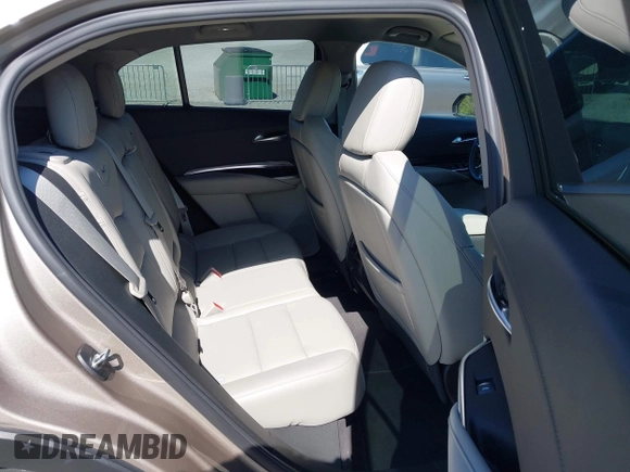 2023 Cadillac XT4 FWD Luxury with VIN 1GYAZAR42PF109650, listed as a IAAI auction lot 41921489 with 23,530 mi miles and . Bid and sale history available at DreamBid. Image 8.
