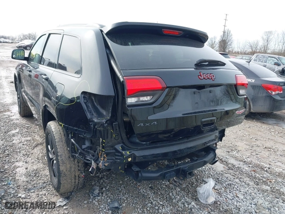 2019 Jeep Grand Cherokee Trailhawk with VIN 1C4RJFLTXKC696820, listed as a IAAI auction lot 41443851 with 50,848 mi miles. Bid and sale history available at carsss.com. Image 6.