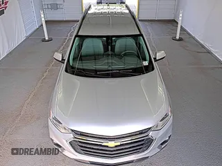 2021 Chevrolet Traverse LT Cloth z VIN 1GNERGKW3MJ163142, wystawiony jako IAAI lot #42325073 z przebiegiem 66 869 mil mil oraz . Historia ofert i sprzedaży dostępna na DreamBid. Obrazek 1.