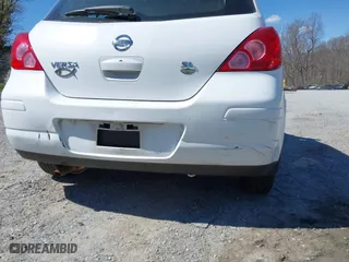 2009 Nissan Versa 1.8 SL with VIN 3N1BC13E19L404019, listed as a IAAI auction lot 41872871 with 192,158 mi miles. Bid and sale history available at carsss.com. Image 6.