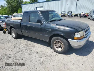 1999 Ford Ranger XLT with VIN 1FTYR14X0XPB02955, listed as a Copart auction lot 55336115 with 126,846 mi miles and Clean Title. Bid and sale history available at DreamBid. Image 4.