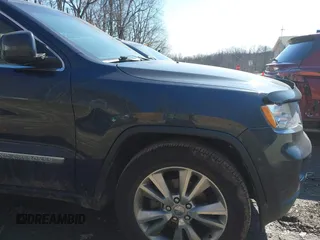 2013 Jeep Grand Cherokee Laredo with VIN 1C4RJFAG4DC653079, listed as a IAAI auction lot 41726726 with 152,356 mi miles. Bid and sale history available at carsss.com. Image 20.