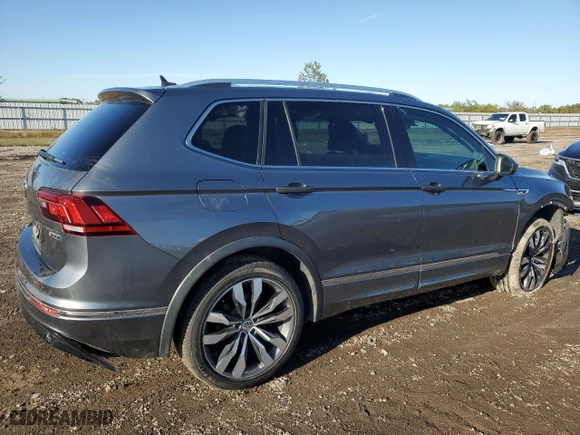 2020 Volkswagen Tiguan SEL Premium R-Line with VIN 3VV4B7AXXLM068664, listed as a Copart auction lot 83243264 with 132,734 mi miles and Salvage Title. Bid and sale history available at carsss.com. Image 3.