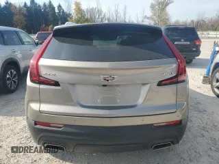 2022 Cadillac XT4 FWD Luxury with VIN 1GYAZAR4XNF121008, listed as a Copart auction lot 77599974 with 29,141 mi miles and Salvage title. Bid and sale history available at DreamBid. Image 6.