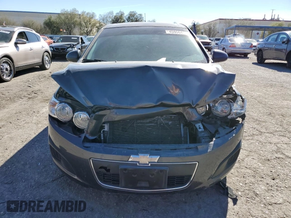 2012 Chevrolet Sonic LS z VIN 1G1JA6SHXC4171044, wystawiony jako Copart lot #45956415 z przebiegiem 133 324 mil mil oraz Szkoda całkowita • Salvage title. Historia ofert i sprzedaży dostępna na DreamBid. Obrazek 5.