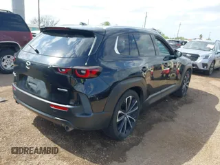 2023 Mazda CX-50 S Premium Plus с VIN 7MMVABEM0PN138970, выставлен на аукционе IAAI как лот 42017075 с пробегом 35 691 миль миль и . История ставок и продаж доступна на DreamBid. Изображение 4.
