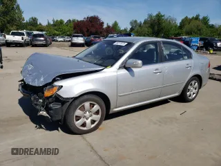 2010 Kia Optima LX z VIN KNAGG4A86A5385166, wystawiony jako Copart lot #56217875 z przebiegiem 144 521 mil mil oraz Szkoda całkowita • Salvage title. Historia ofert i sprzedaży dostępna na DreamBid. Obrazek 1.