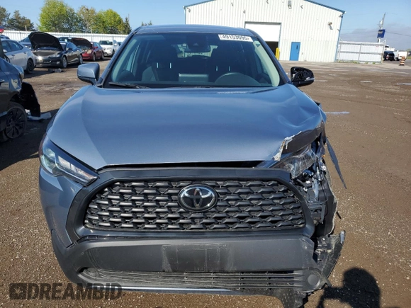 2022 Toyota Corolla Cross LE with VIN 7MUCAABGXNV025847, listed as a Copart auction lot 49153095 with 37,789 mi miles and Salvage title. Bid and sale history available at DreamBid. Image 5.