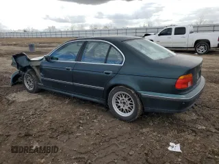 2000 BMW 5 Series 528iA with VIN WBADM6346YGU20515, listed as a Copart auction lot 43608485 with 197,903 mi miles and Salvage Title. Bid and sale history available at carsss.com. Image 2.