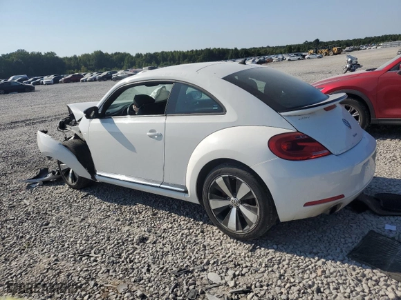 2012 Volkswagen Beetle 2.0T Turbo w/Sun/Sound PZEV with VIN 3VWVA7AT9CM612734, listed as a Copart auction lot 69196224 with 0 mi miles and Salvage Title. Bid and sale history available at carsss.com. Image 2.