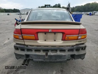 2001 Saturn LS z VIN 1G8JW54R11Y557232, wystawiony jako Copart lot #74638904 z przebiegiem 158 729 mil mil oraz Szkody całkowita. Historia ofert i sprzedaży dostępna na DreamBid. Obrazek 6.