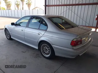 2002 BMW 5 Series 540i z VIN WBADN63412GN86932, wystawiony jako IAAI lot #42322111 z przebiegiem 143 949 mil mil oraz . Historia ofert i sprzedaży dostępna na DreamBid. Obrazek 3.