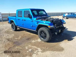 2024 Jeep Gladiator Willys z VIN 1C6HJTAG0RL123040, wystawiony jako IAAI lot #41849222 z przebiegiem 14 989 mil mil oraz . Historia ofert i sprzedaży dostępna na DreamBid. Obrazek 1.